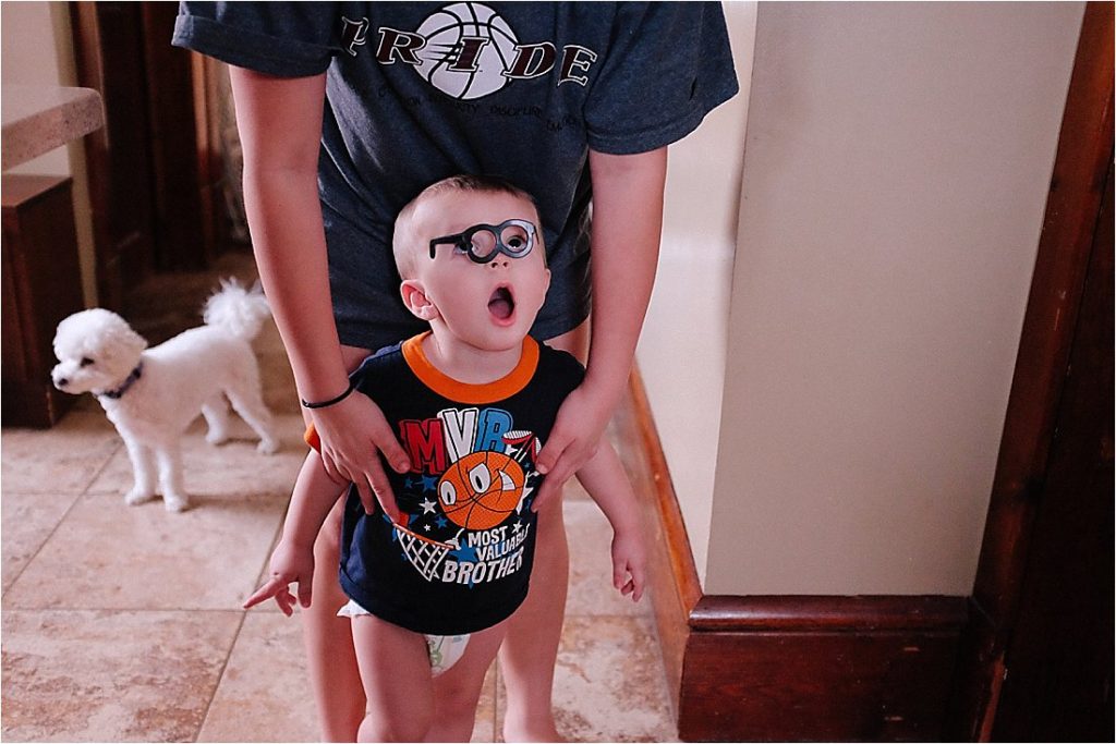 toddler with mr potato head glasses