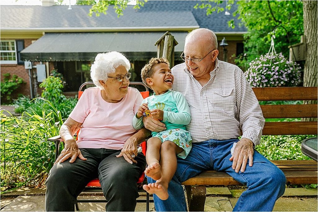 grandparents with grandchildren at the pool